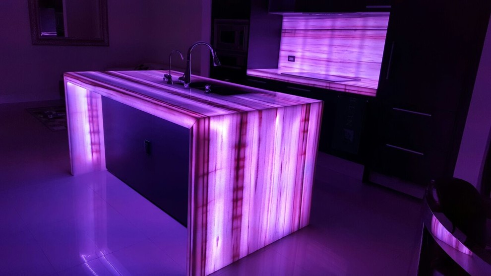 Design ideas for a modern kitchen in Miami with onyx benchtops.