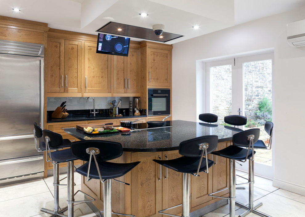 Inspiration for an expansive contemporary kitchen in Wiltshire with stainless steel appliances and multiple islands.