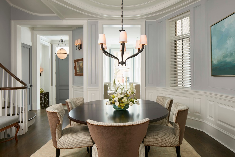 Elegant dark wood floor dining room photo in Chicago with blue walls and no fireplace