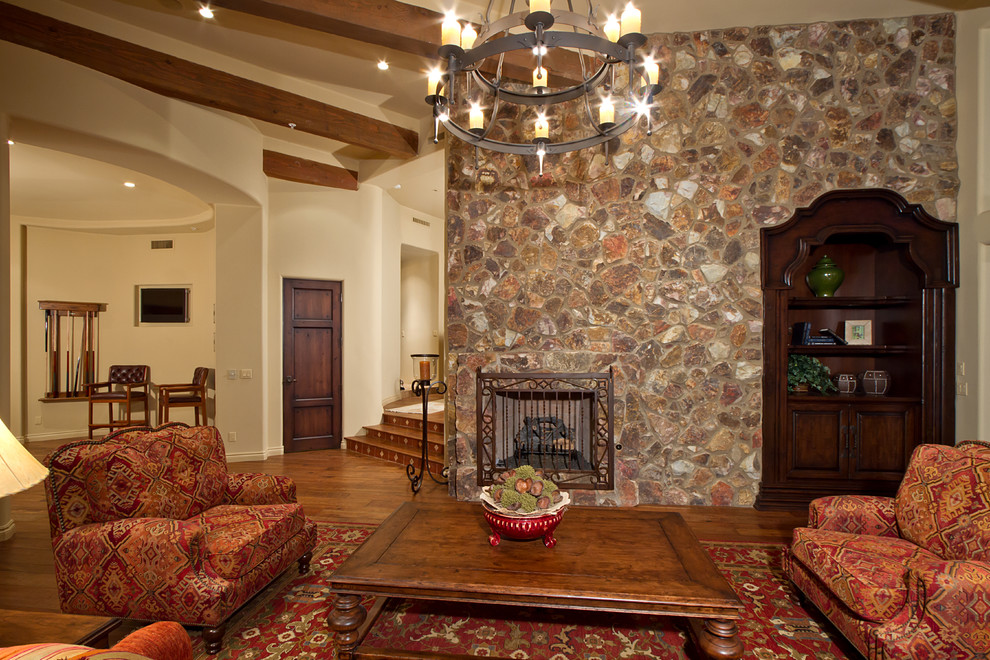 Example of a mountain style home design design in Phoenix
