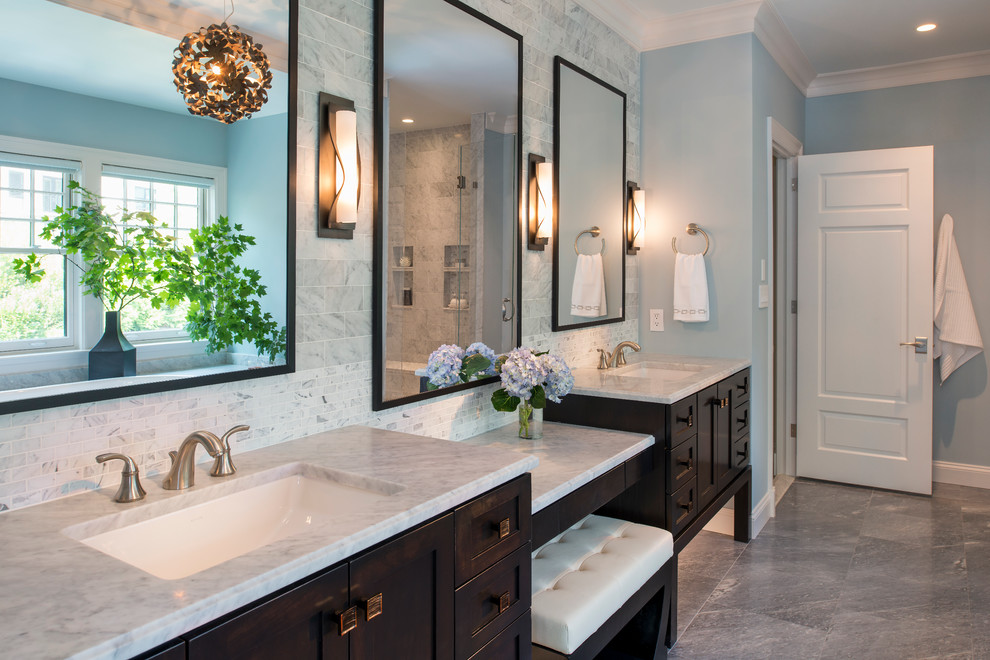 Transitional gray tile bathroom photo in DC Metro with an undermount sink, dark wood cabinets, blue walls and shaker cabinets