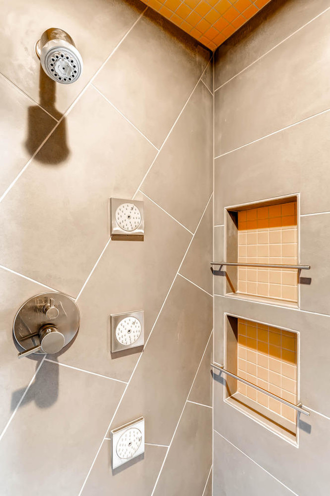 Inspiration for a mid-sized rustic master black tile and cement tile concrete floor corner shower remodel in Denver with flat-panel cabinets, light wood cabinets, a one-piece toilet, brown walls, a vessel sink and quartzite countertops