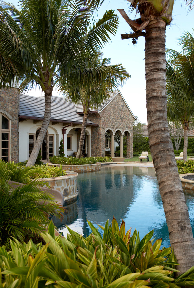 Expansive mediterranean custom-shaped pool in Miami.