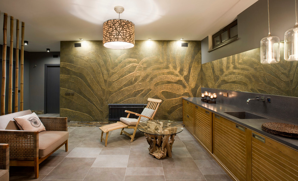 This is an example of a large country look-out basement in Moscow with grey walls, slate floors and no fireplace.