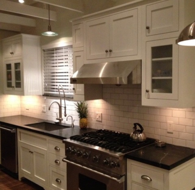 Example of a transitional kitchen design in Miami
