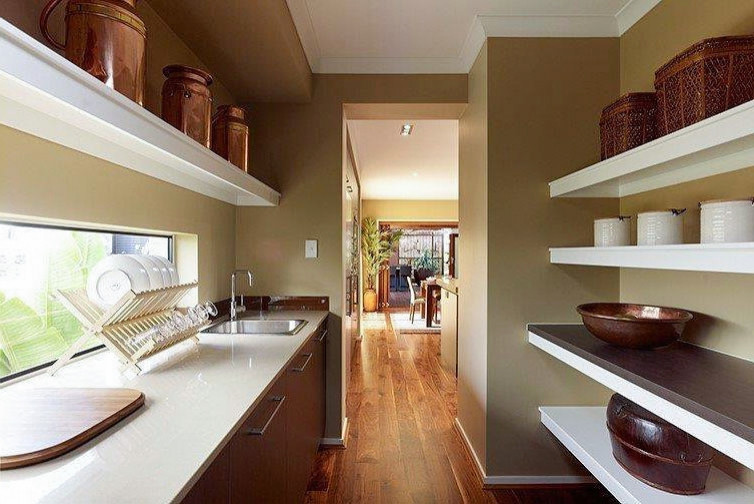 Design ideas for a contemporary galley kitchen pantry in Sunshine Coast with a single-bowl sink, flat-panel cabinets, brown cabinets, solid surface benchtops, multi-coloured splashback, glass sheet splashback, stainless steel appliances, medium hardwood floors, with island, brown floor and beige benchtop.