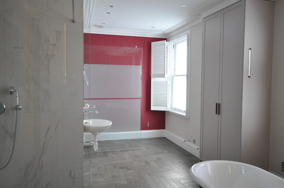 This is an example of a contemporary bathroom in London with a freestanding tub.