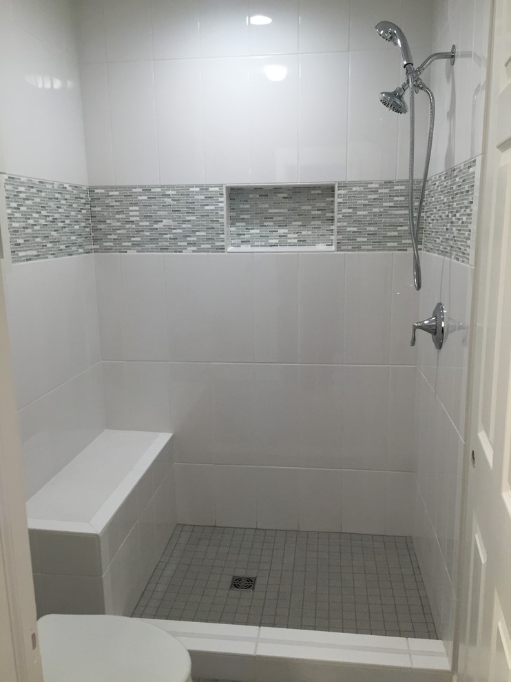 Design ideas for a small transitional 3/4 bathroom in Other with an alcove shower, gray tile, white tile, ceramic tile and porcelain floors.