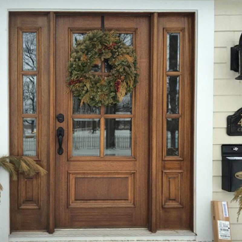 Inspiration for a traditional front door in Austin with a light wood front door.
