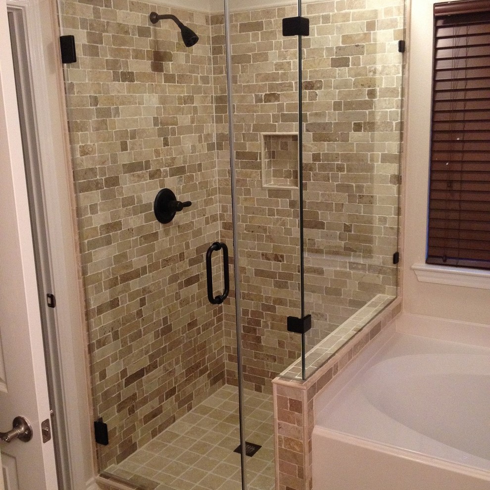 Design ideas for a mid-sized country master bathroom in Houston with a corner shower, beige tile and stone tile.