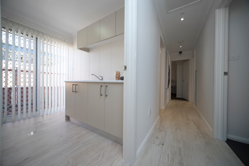 Inspiration for a transitional laundry room in Canberra - Queanbeyan.