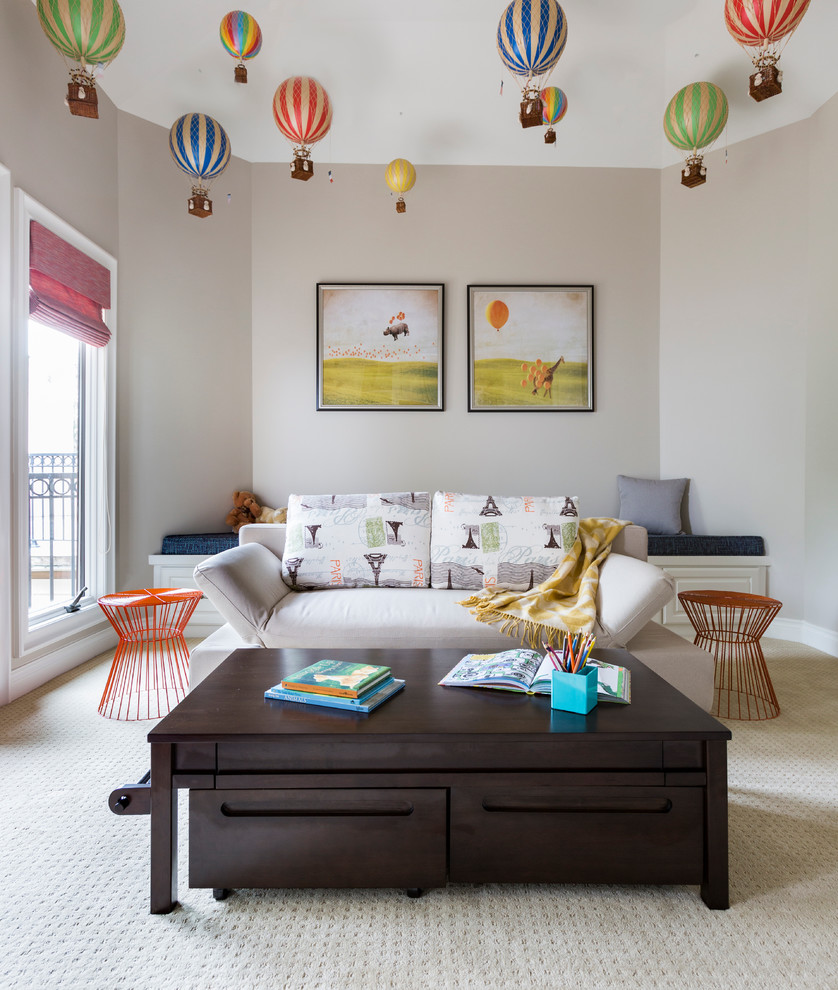 Photo of a transitional gender-neutral kids' playroom for kids 4-10 years old in Houston with white walls and carpet.