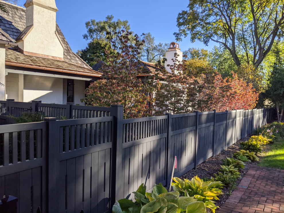 Design ideas for a french country front yard wood fence landscaping in Detroit.