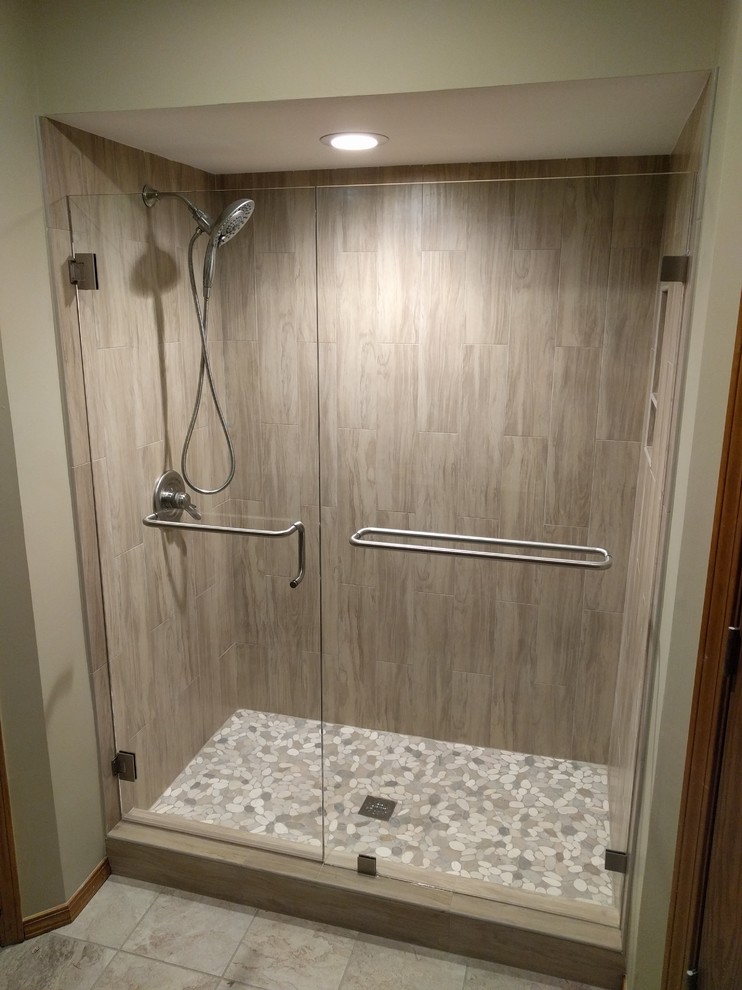 Bathroom - transitional bathroom idea with a hinged shower door