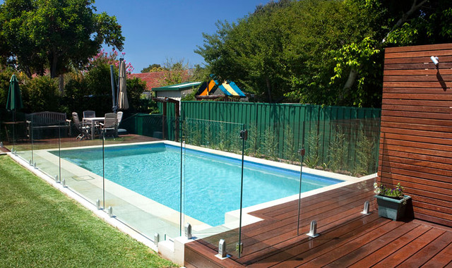 swimming pool with glass fencing