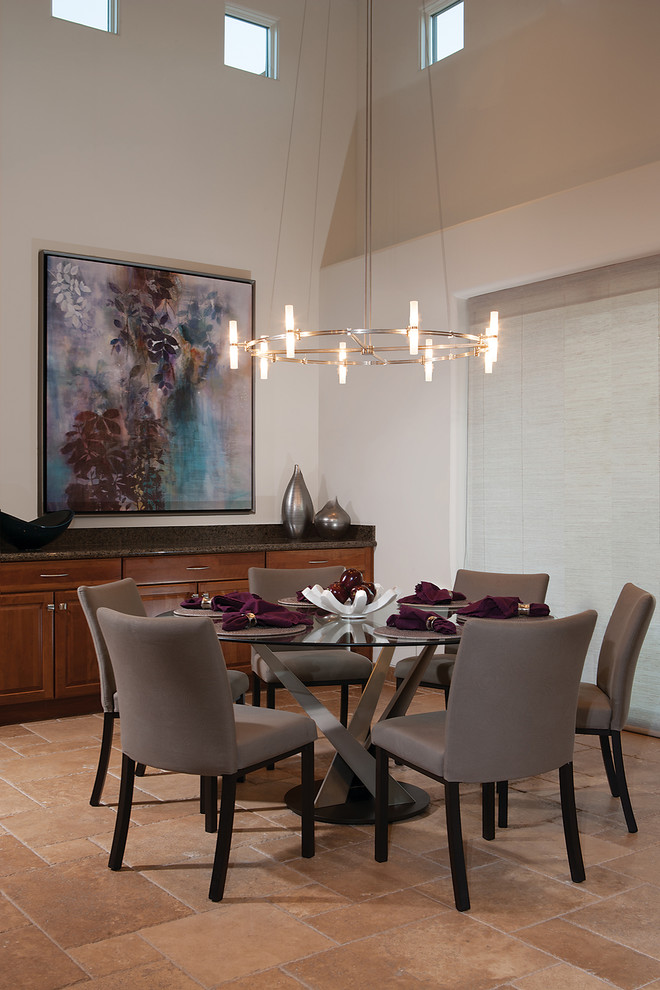 Design ideas for a large modern separate dining room in Phoenix with beige walls, travertine floors, no fireplace and beige floor.