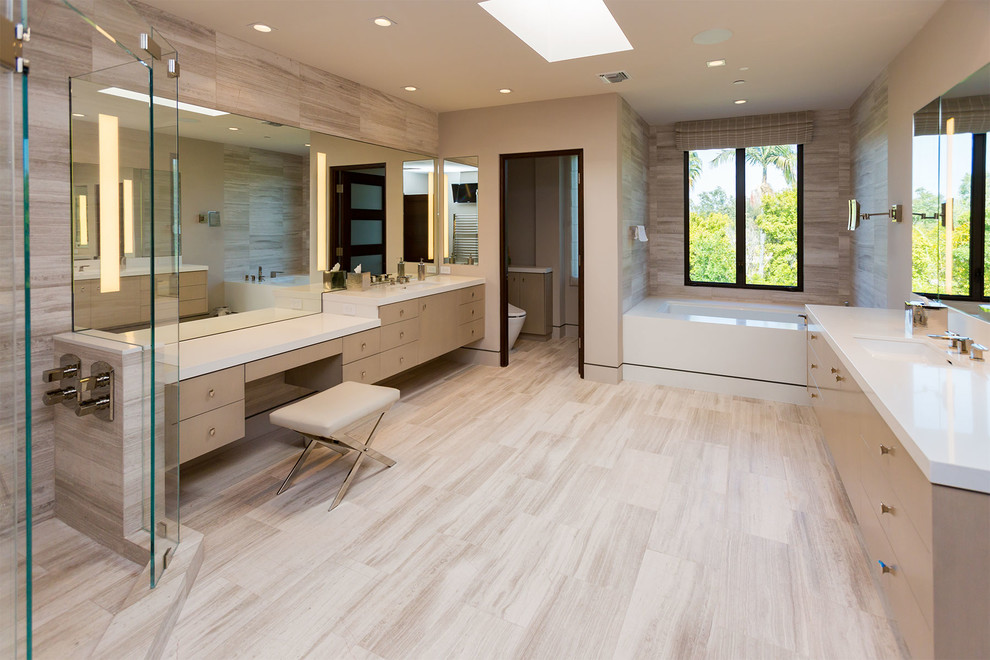 Inspiration for a large contemporary master bathroom in Los Angeles with flat-panel cabinets, grey cabinets, an undermount tub, a double shower, a bidet, porcelain tile, beige walls, porcelain floors, an undermount sink, engineered quartz benchtops, grey floor, an open shower and white benchtops.