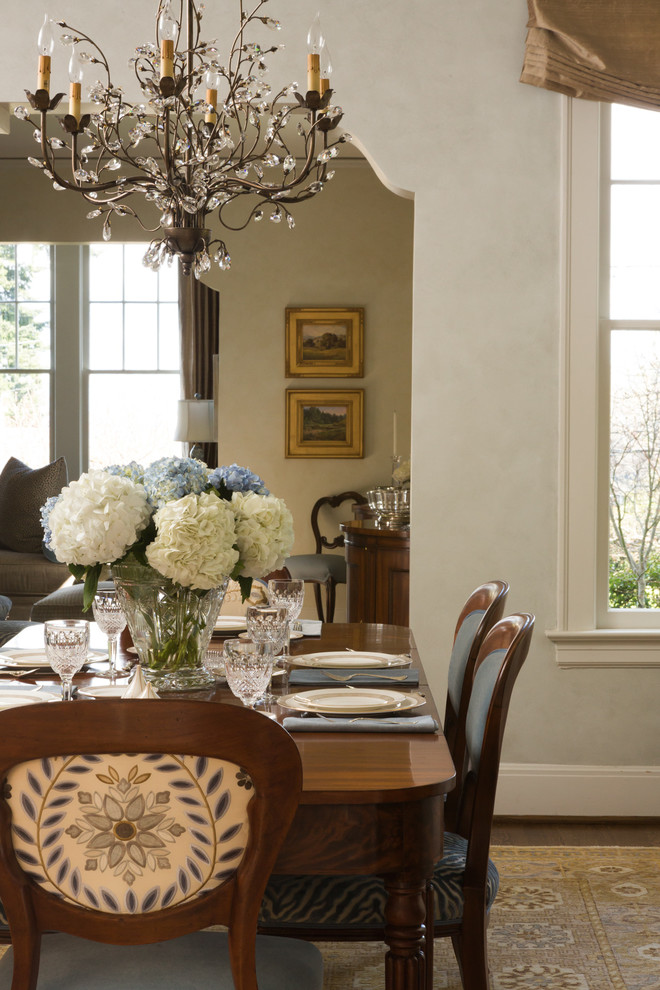 Photo of a large traditional separate dining room in Portland with dark hardwood floors, grey walls and no fireplace.