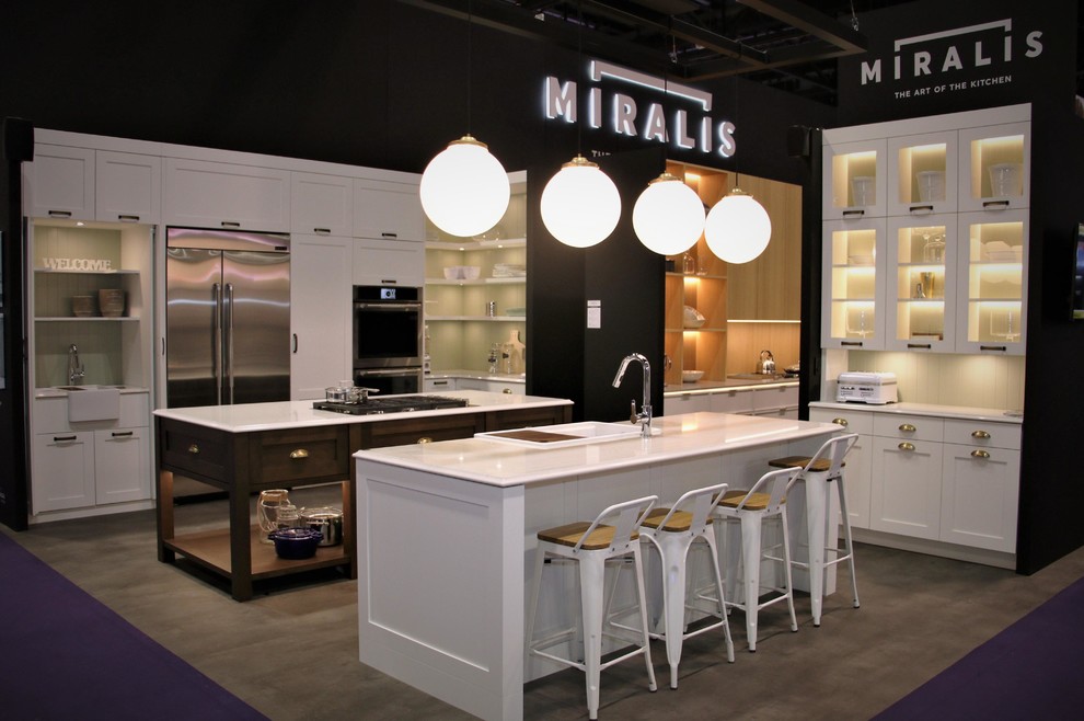 Kitchen - large transitional l-shaped kitchen idea with shaker cabinets, white cabinets, stainless steel appliances and two islands
