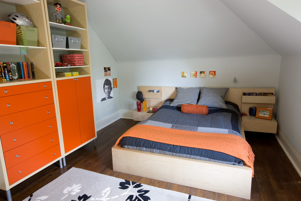 Mid-sized contemporary kids' room in Toronto with grey walls and dark hardwood floors for boys.