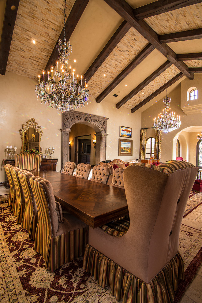 This is an example of a traditional open plan dining in Phoenix with beige walls.