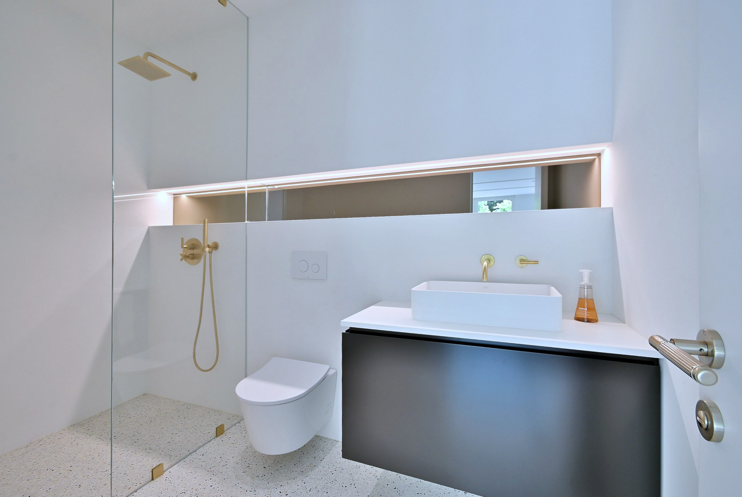 Mid-Century Modern Bathroom with Illuminated Niche