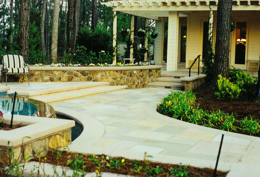 This is an example of a contemporary patio in Charleston.