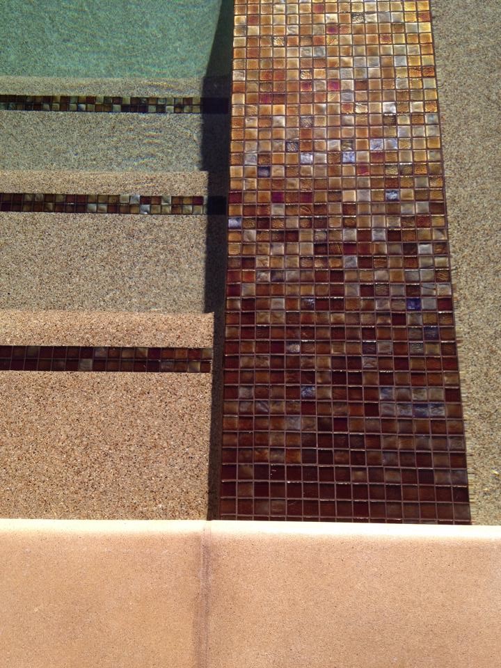 Inspiration for a timeless backyard tile and rectangular pool remodel in Orange County