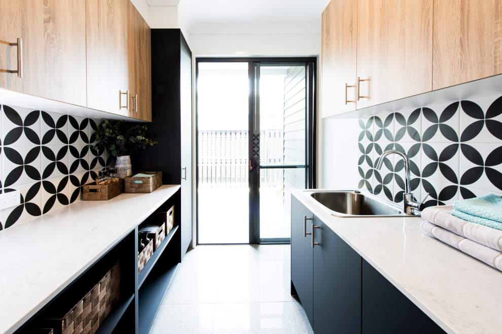 Design ideas for a contemporary laundry room in Sunshine Coast.
