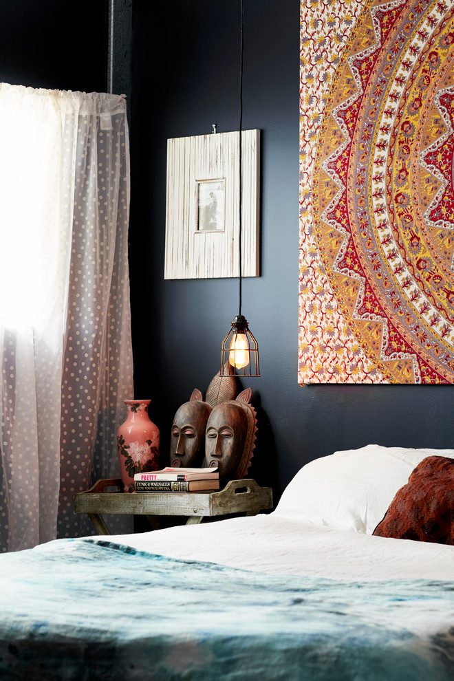 Inspiration for an eclectic bedroom in Gold Coast - Tweed with black walls.