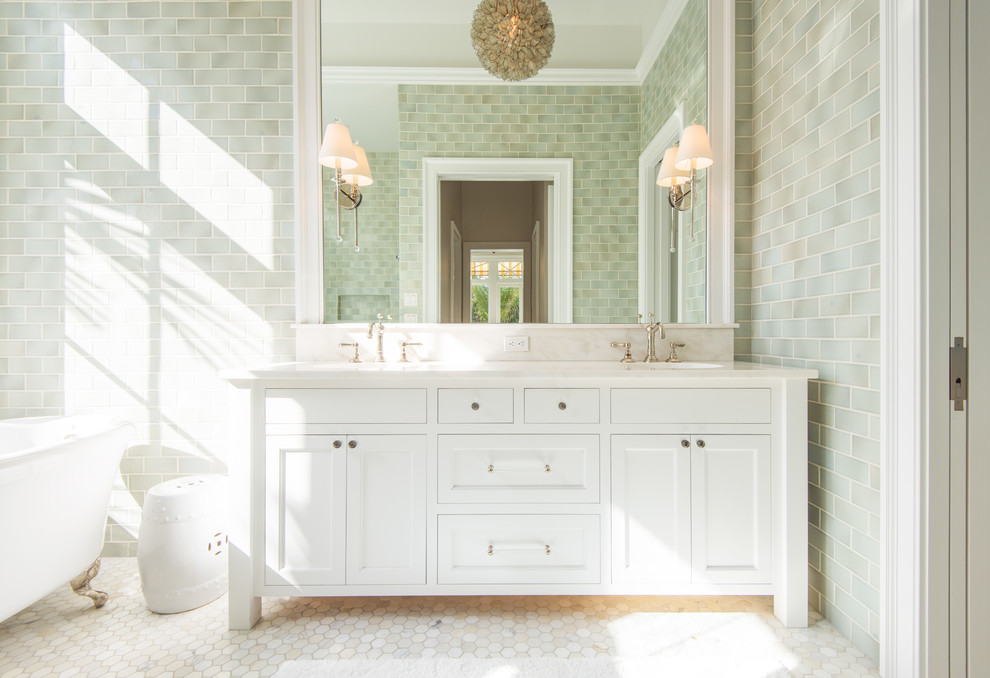 Mid-sized traditional master bathroom in Tampa with furniture-like cabinets, white cabinets, a claw-foot tub, an alcove shower, a two-piece toilet, green tile, ceramic tile, beige walls, mosaic tile floors, an undermount sink, marble benchtops and grey floor.