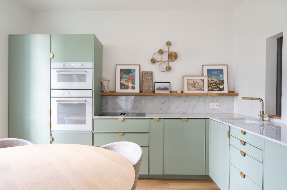 Design ideas for a farmhouse open plan kitchen in Paris with a submerged sink, beaded cabinets, green cabinets, marble worktops, grey splashback, marble splashback, white appliances and grey worktops.