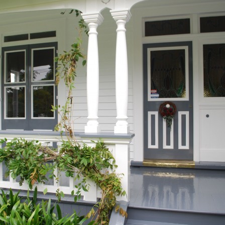 Photo of a traditional white exterior in Melbourne with wood siding.