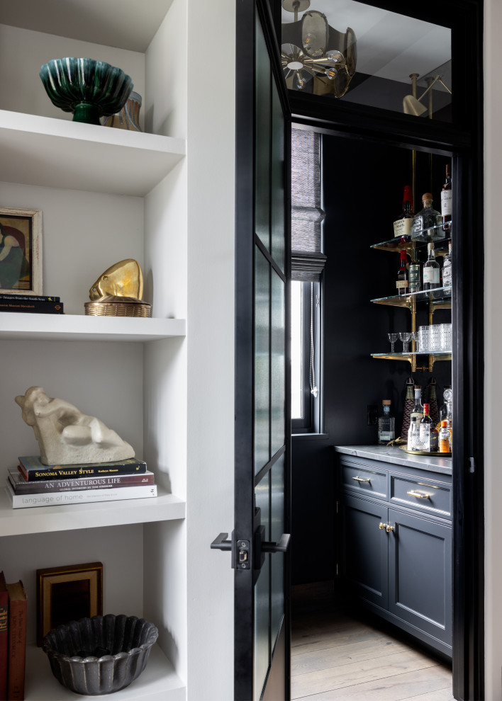 Example of a transitional home bar design in Chicago