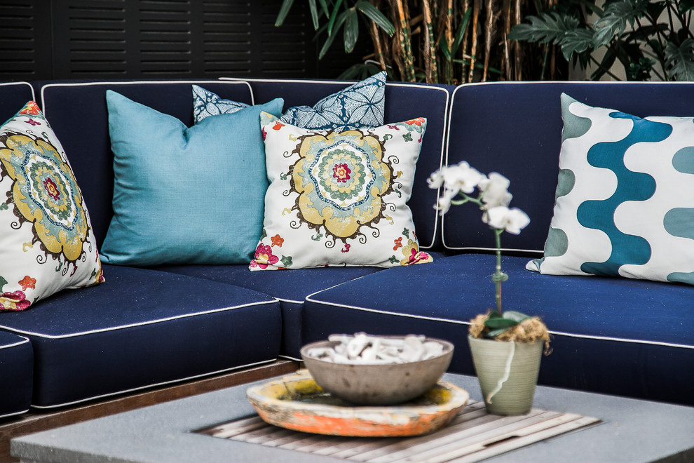 Inspiration for a large contemporary backyard patio in Sydney with concrete pavers.