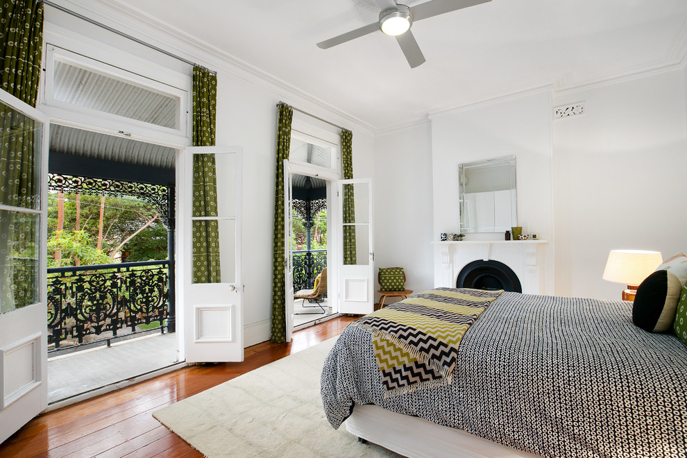 Design ideas for a transitional master bedroom in Sydney.