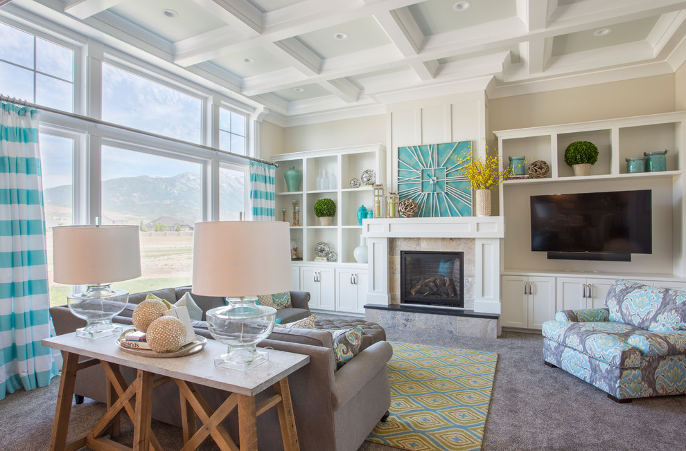 Inspiration for a beach style open concept family room in Salt Lake City with beige walls, carpet, a standard fireplace, a tile fireplace surround and a built-in media wall.
