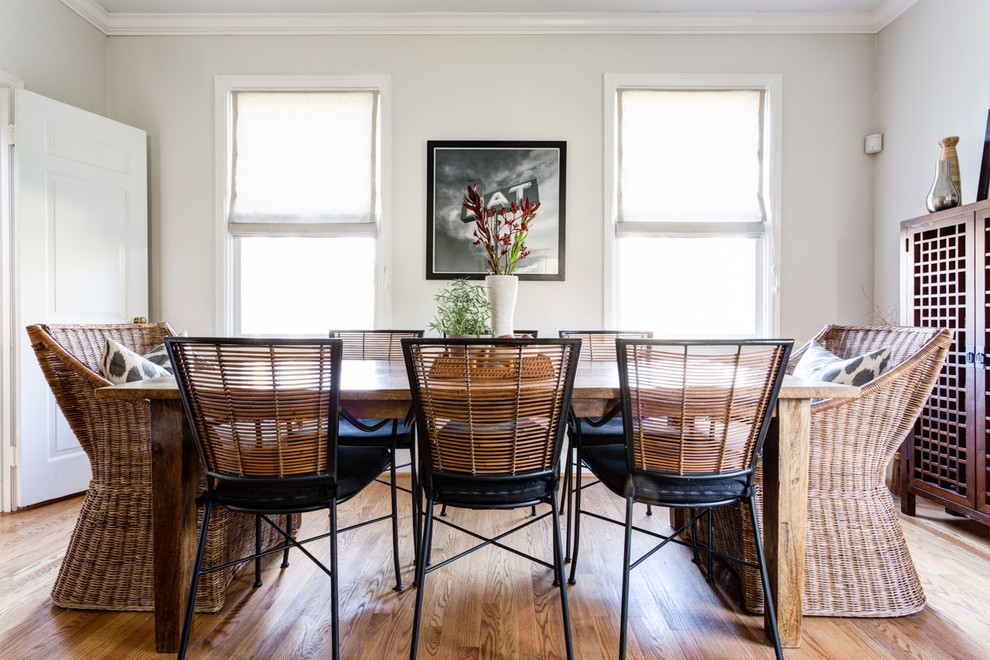 Inspiration for a contemporary dining room in Other with light hardwood floors.