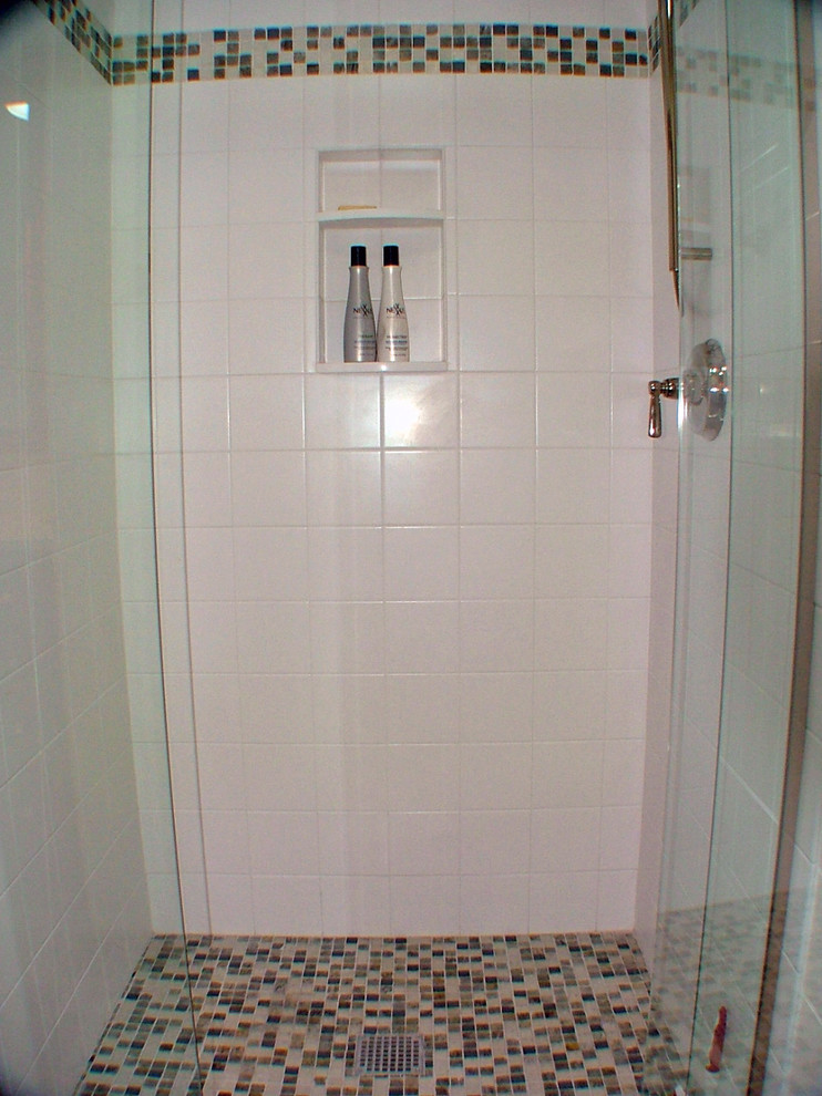 Photo of a small traditional 3/4 bathroom in Portland Maine with an alcove shower.