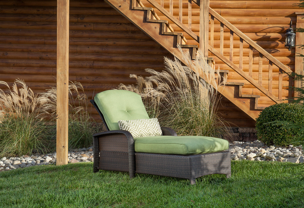 Transitional backyard home design photo