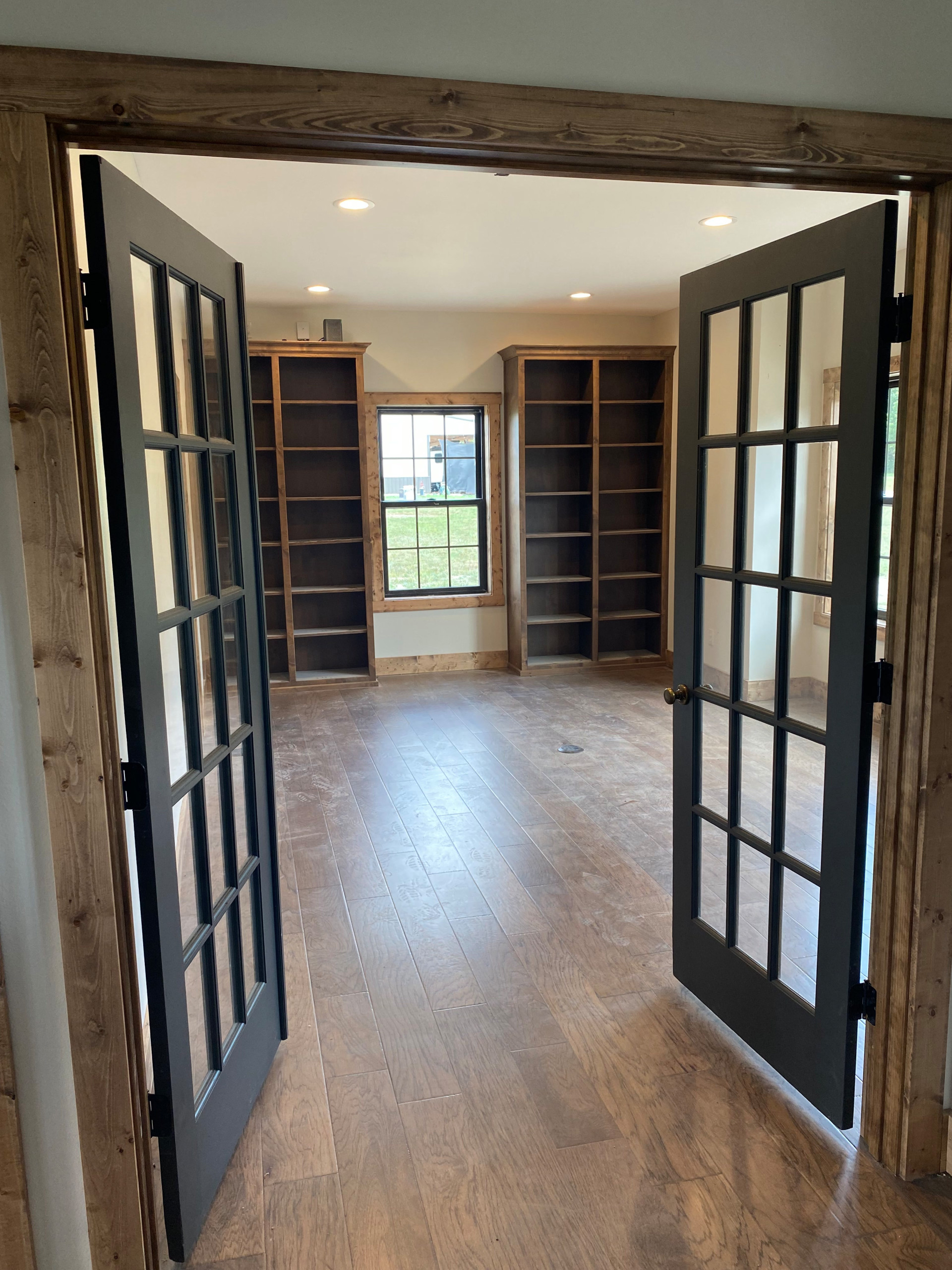 Home office with custom stained built-ins