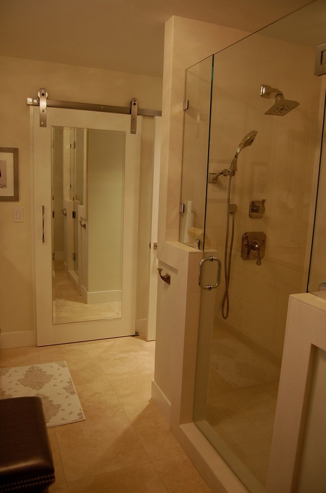 Inspiration for a mid-sized transitional master beige tile and stone tile travertine floor bathroom remodel in Orange County with an undermount sink, shaker cabinets, white cabinets, limestone countertops, a one-piece toilet and beige walls