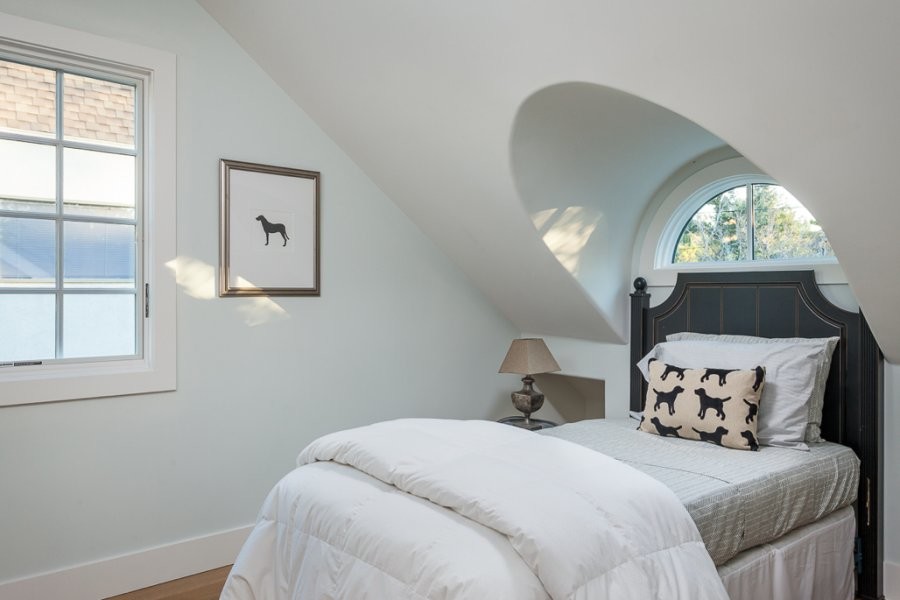 Bedroom - small farmhouse light wood floor bedroom idea in San Francisco with white walls