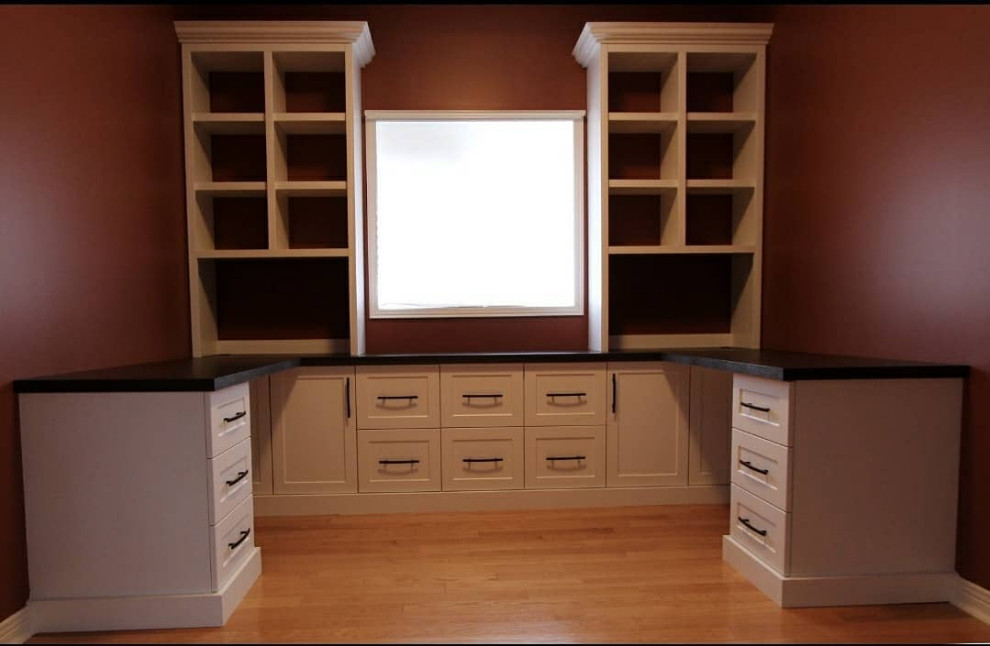 Home office - built-in desk home office idea in Toronto