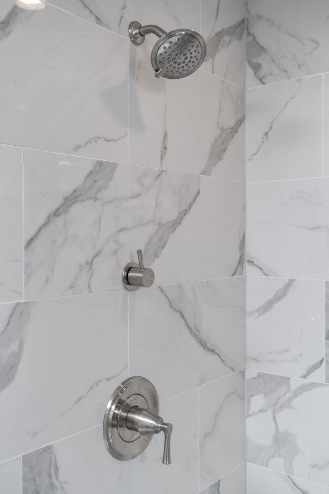 Inspiration for a large transitional master multicolored tile and mosaic tile porcelain tile double shower remodel with gray walls, an undermount sink and quartz countertops
