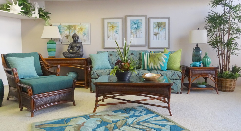Inspiration for a mid-sized tropical living room in Hawaii with beige walls, carpet, no fireplace and beige floor.