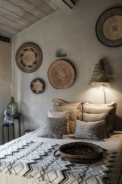 Une t&ecirc;te de lit originale exotisk-sovrum