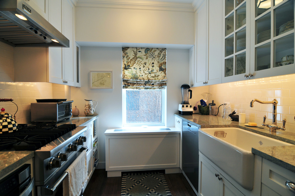 Transitional galley dark wood floor eat-in kitchen photo in New York with shaker cabinets, marble countertops, an undermount sink, white cabinets, porcelain backsplash and stainless steel appliances