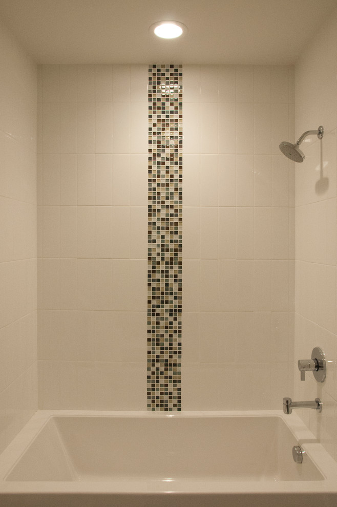 Design ideas for a contemporary bathroom in Salt Lake City with a drop-in tub, a shower/bathtub combo, white tile, ceramic tile and ceramic floors.
