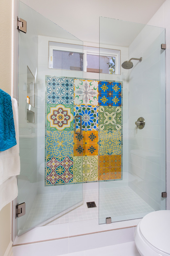 Example of a mid-sized tuscan 3/4 white tile and porcelain tile porcelain tile alcove shower design in San Diego with recessed-panel cabinets, green cabinets, a two-piece toilet, beige walls, an undermount sink and quartz countertops